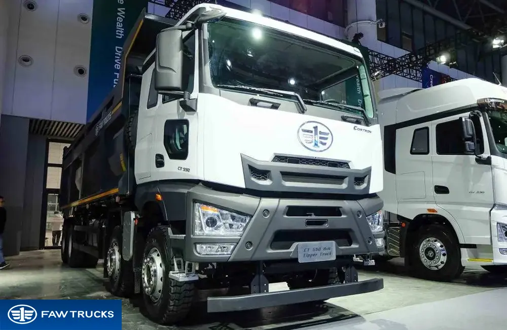 White CORTRON dump truck with FAW branding, featuring a heavy-duty tipper body for construction and mining applications.