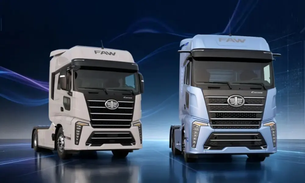 Front view of a white CORTRON heavy-duty tractor truck with FAW logo, chrome grille and overseas commercial vehicle styling.