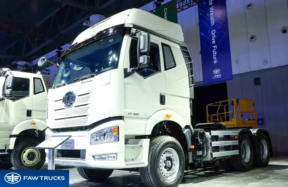 Front view of a white CORTRON heavy-duty tractor truck with FAW logo, chrome grille and overseas commercial vehicle styling.
