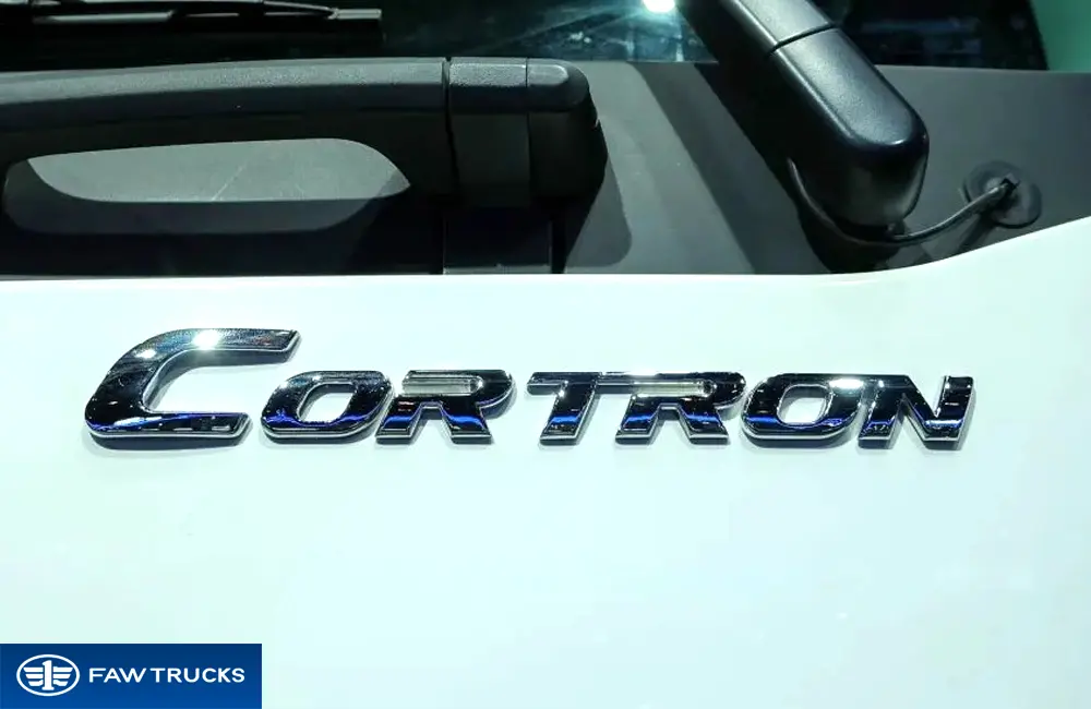 White CORTRON dump truck with FAW branding, featuring a heavy-duty tipper body for construction and mining applications.