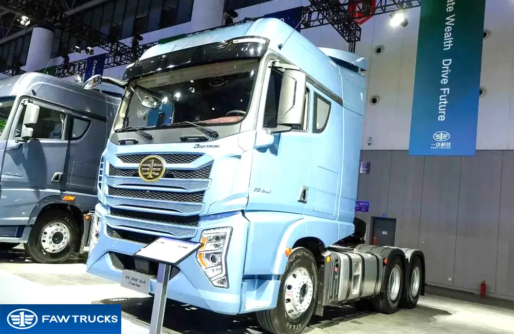 Light blue DORTRON DS 640 6x4 tractor truck displayed at an exhibition, featuring FAW branding and a heavy-duty tractor configuration.