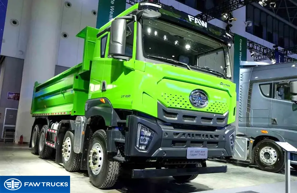 Green DORTRON DT 460 8x4 dump truck displayed at an exhibition, featuring FAW branding and a heavy-duty tipper configuration.