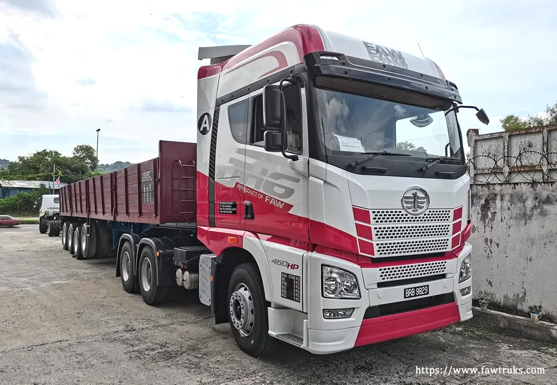 FAW JH6 460HP truck tractor with red drop-side trailer in Mexico