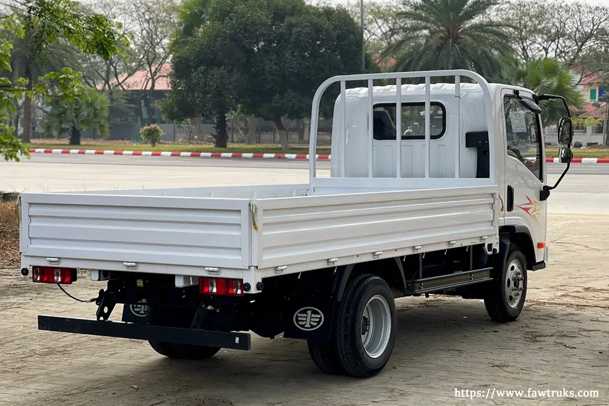 FAW light truck dropside variant in the Philippines with white cargo bed
