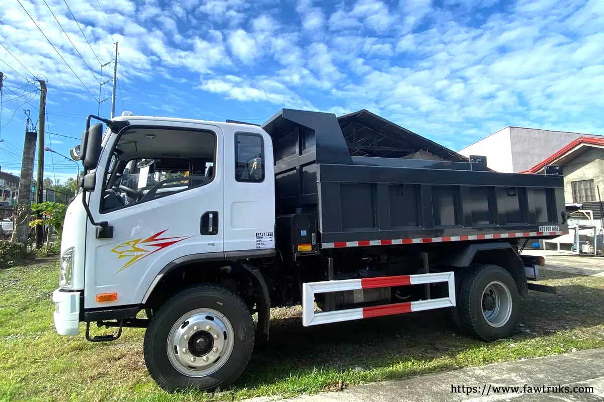 FAW Tiger 6G dump truck in the Philippines, white body with red and white side markers