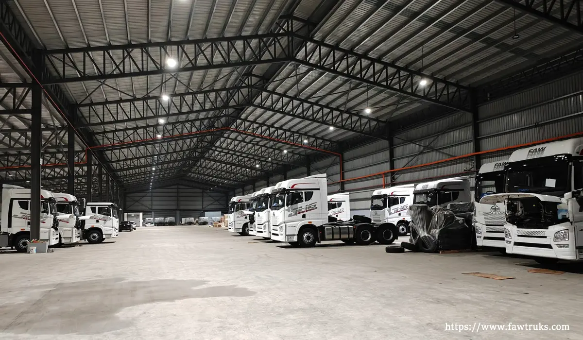 FAW trucks parked inside a warehouse in Mexico